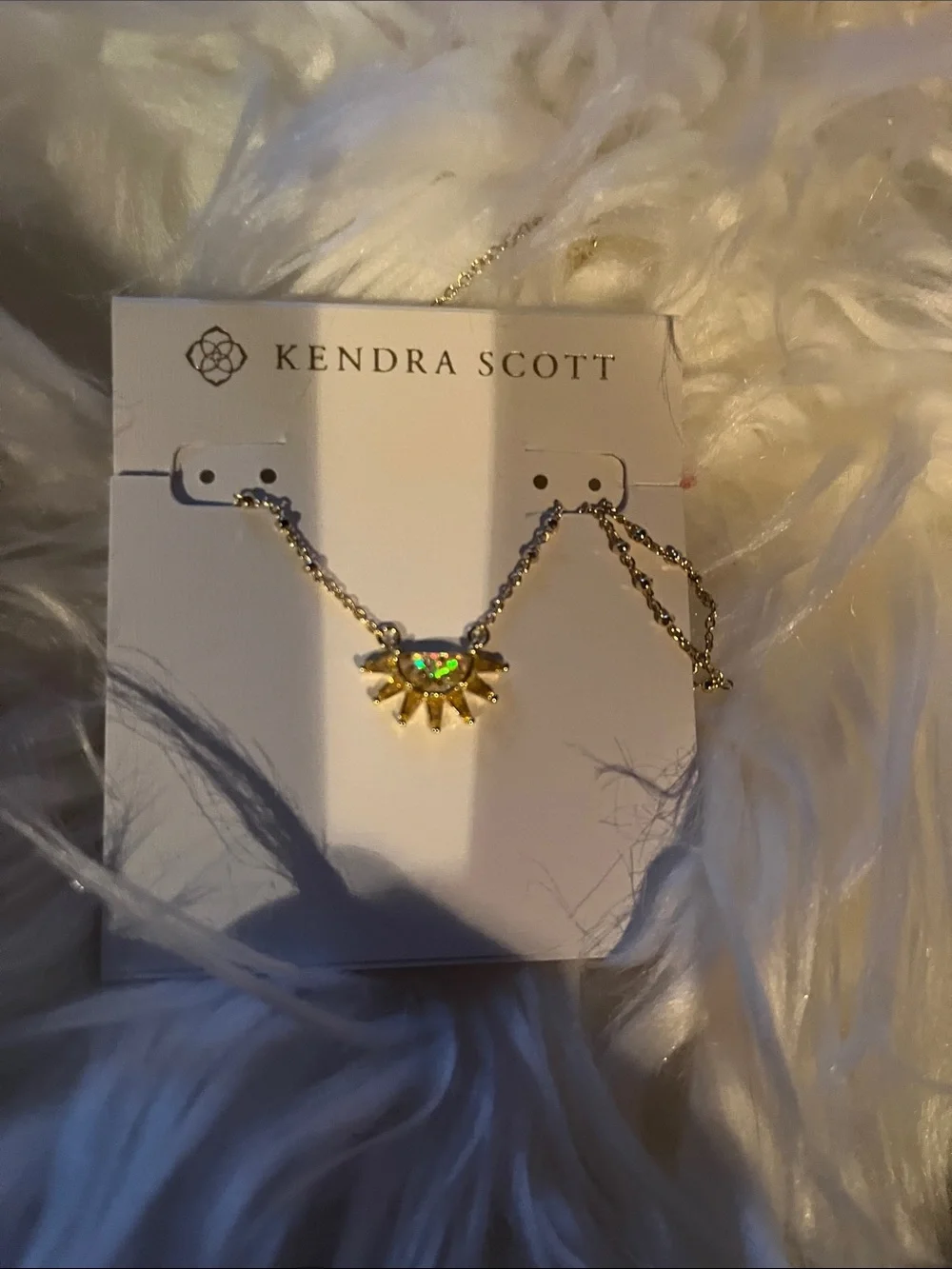 Kendra Scott Gold Sunburst Necklace with Iridescent Green Stone